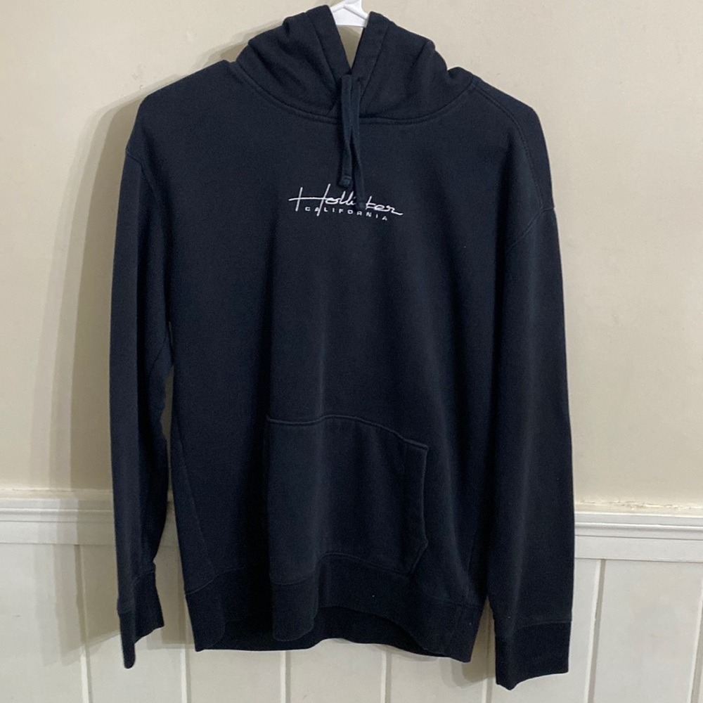 Brand is hollister , color is dark blue size is small